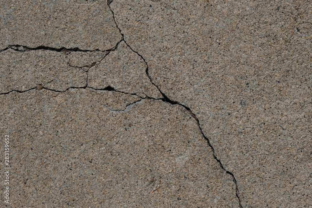 Fototapeta premium Crack on a concrete surface in Los Angeles for interior design.