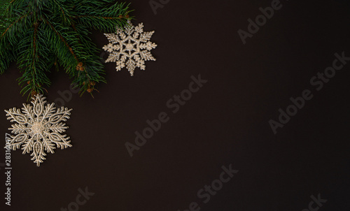Christmas holidays background with copy space for your text. Pine branches with beautiful christmas ornament.