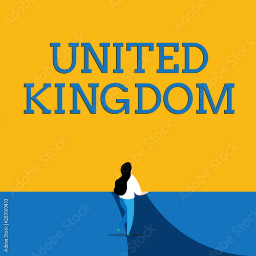 Conceptual hand writing showing United Kingdom. Concept meaning Island country located off the northwestern coast of Europe Back view young long hair woman holding blank square announcement