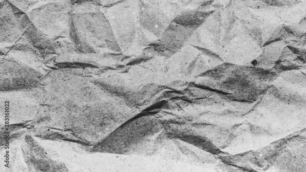 Crumpled paper sheet seamless texture, black and white copy space, motion graphic Crumpled paper sheet seamless texture, black and white copy space, motion graphic