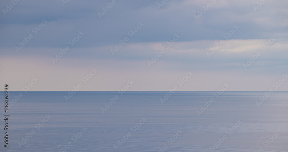 Sea in cloudy weather. Calm sea. View of the sea from a height. Anapa district. The vastness of Russia. Black Sea . Summer landscape sea and sky