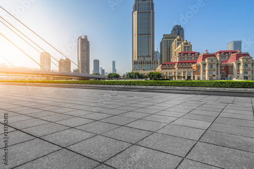 empty floor and city skyline under blue sky, tianjin, china.