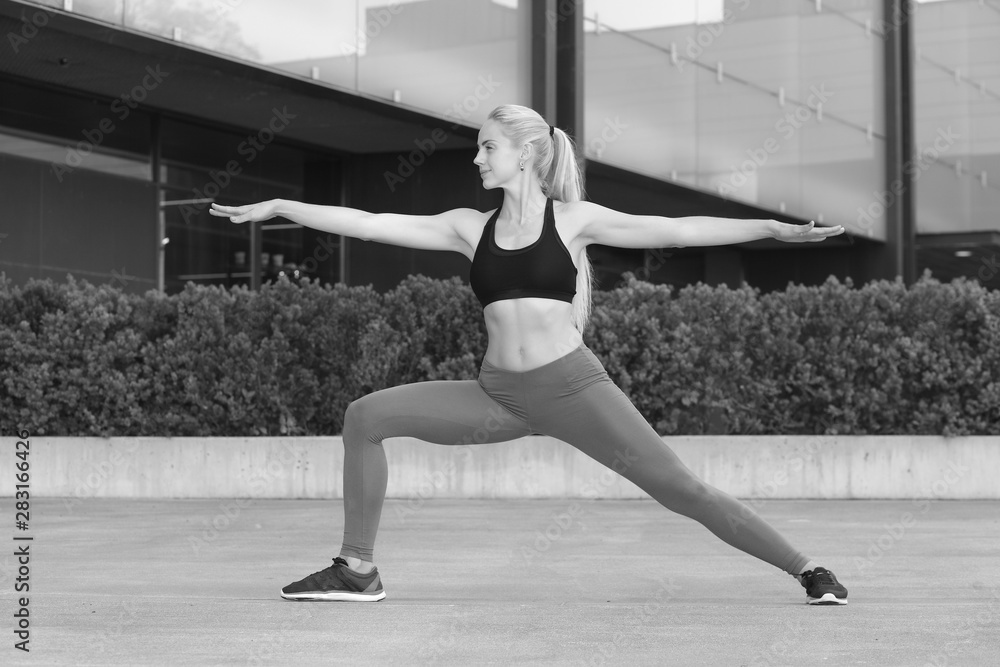 Fototapeta premium Fitness young girl doing exercises