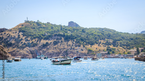 Balaklava bay in summer in sunny weather. Crimea, Russia. A lot of boats and ships. Bay for boats. © alenka2194