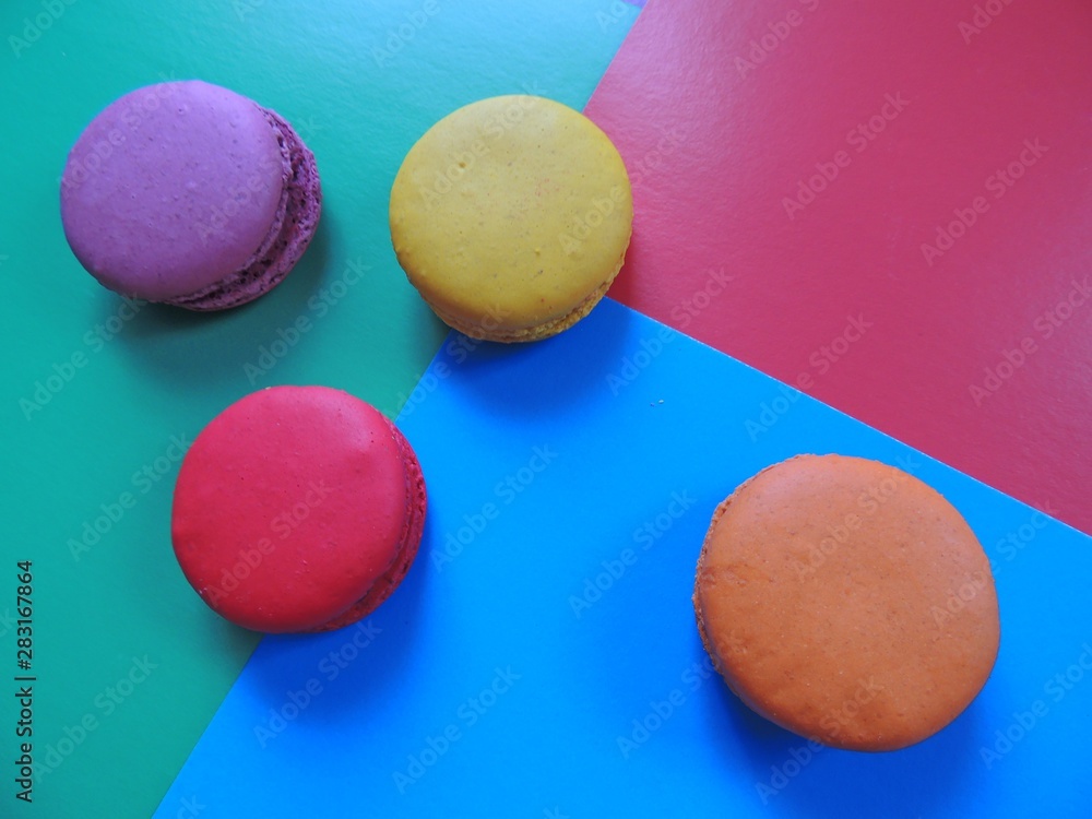 Fototapeta premium colorful cakes delicious and sweet on abstract background