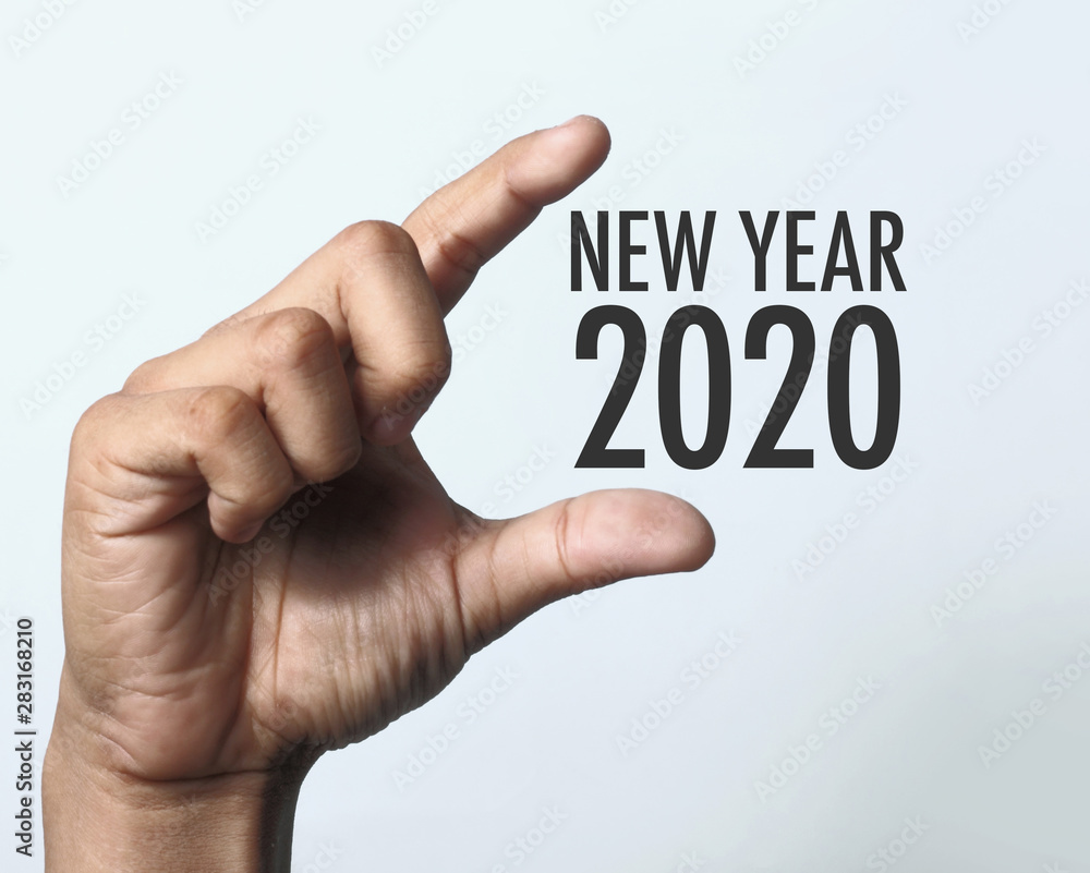 Year 2020 with hand. Year 2020 with hand.