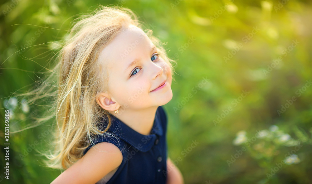 lovely cute little girl playing outdoors at sunset, walking and having fun, happy childhood lovely cute little girl playing outdoors at sunset, walking and having fun, happy childhood