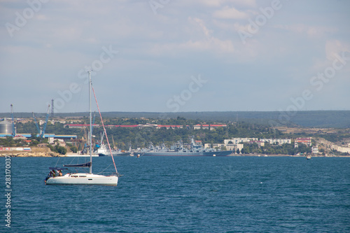 Sevastopol Bay in the summer in sunny weather. Crimea, Russia. A lot of boats and ships. Bay for boats.