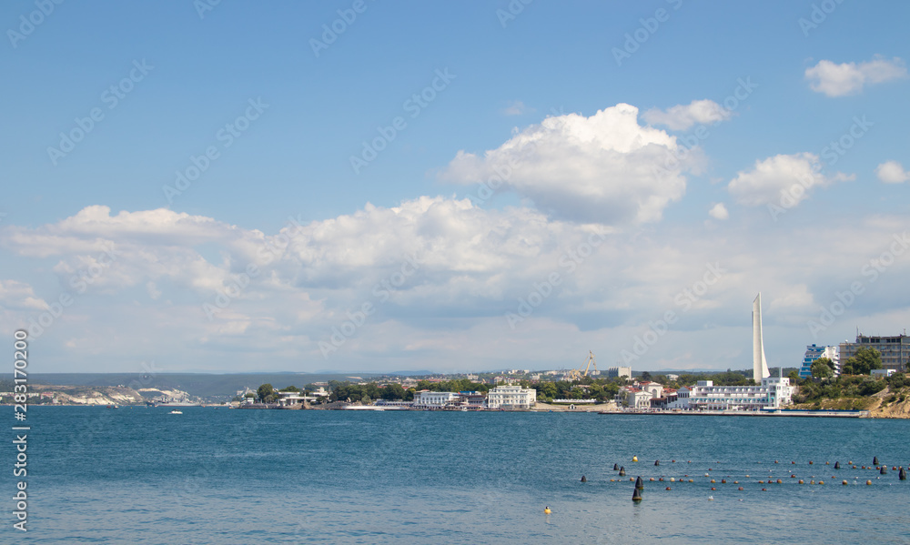 Sevastopol Bay in the summer in sunny weather. Crimea, Russia. A lot of boats and ships. Bay for boats.
