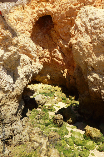 Small cave and rock formation in the Ponta Da Piedade Headland in Lagos