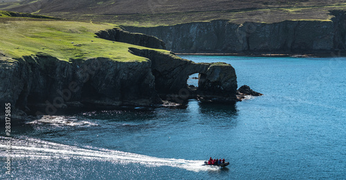 Panorama of Fair Isle in Scotland at the sunny day photo