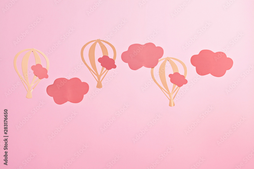 Mock up with pink paper clouds and flying balloons