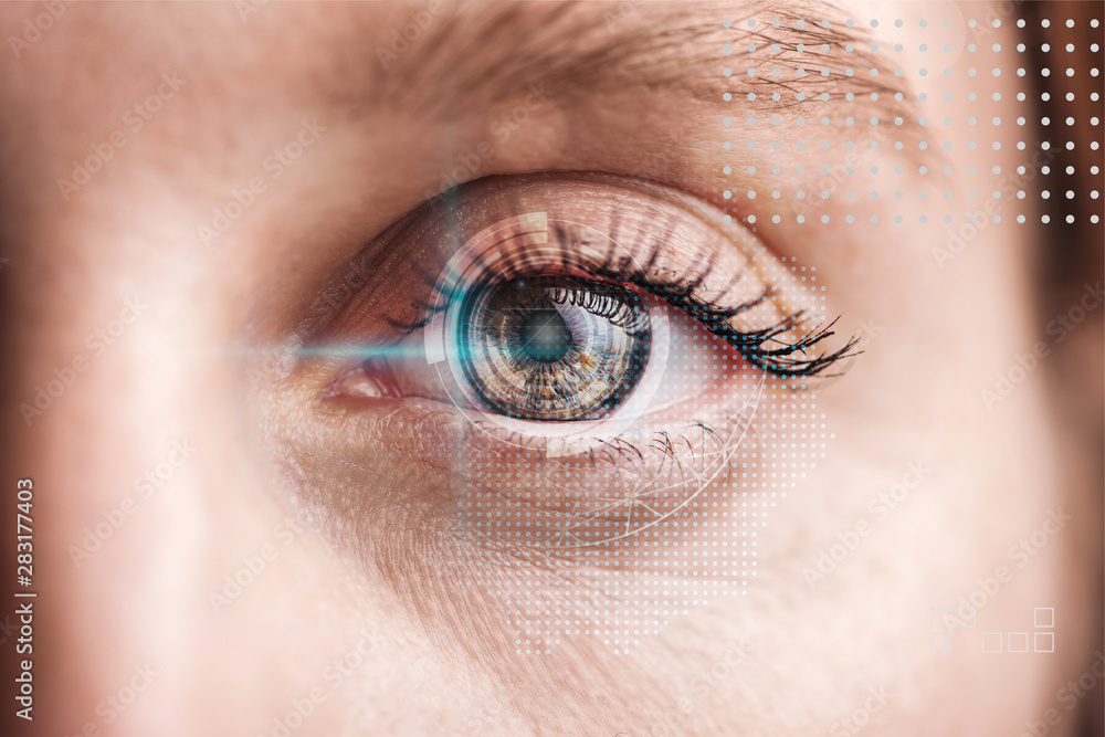 Fototapeta premium close up view of human eye with data illustration, robotic concept