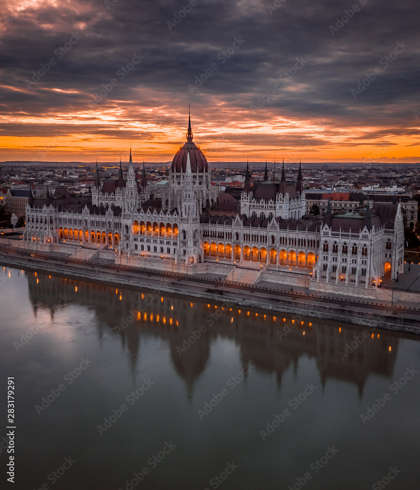 Budapest, Hungary - Aerial panoramic view of the Parliament of Hungary at sunset/sunrise over River Danube and beautiful dramatic purple clouds