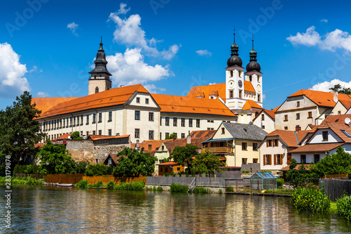 View of Telc across pond with reflections, Unesco world heritage site, South Moravia, Czech Republic. © Sergey Fedoskin