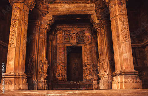 Carvings and reliefs inside sacred Hindu temple in Khajuraho, India. Artworks, columns and altar in the 10th century indian temple