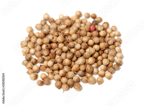 Coriander seeds on white background 