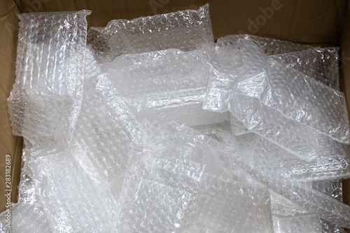 used bubble plastic bag in paper box for recycling.