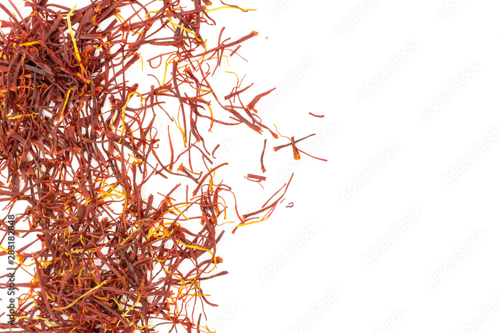 Naklejka premium Lot of whole dry shaffron thread copyspace on right flatlay on white background