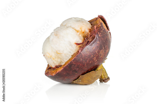 One half of deep purple mangosteen juicy flesh isolated on white background