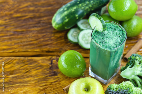 Fresh green juice, detox viterra, Brazilian vegetable juice and green fruits. Drink that has components that favor liver cleansing. Diet or regimen concept. Space for text, banner.