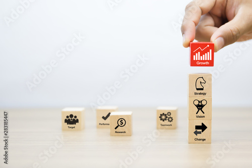 Strategy and planning graphic icons for Business success on wooden blocks