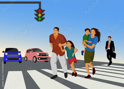 People crossing the crosswalk have car stopped waiting with blue sky background
