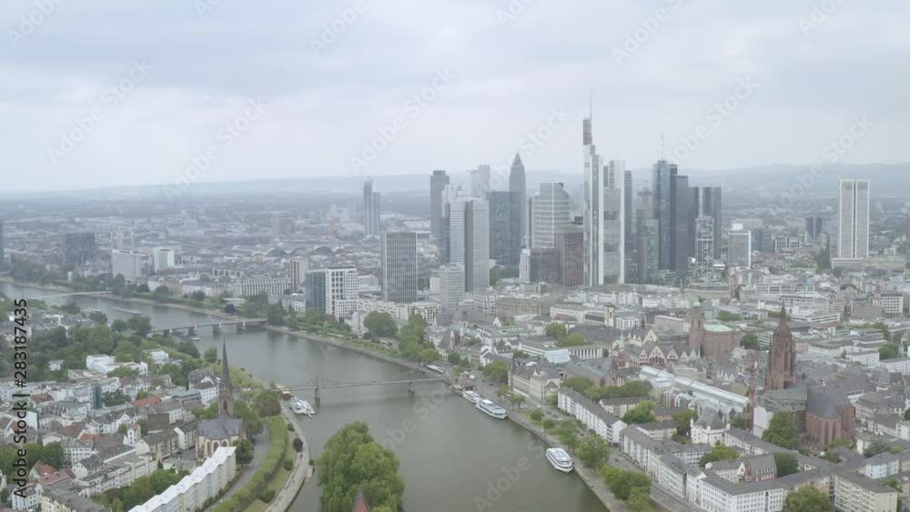 Frankfurt city aerial view with river, towers, banks, offices, boats and bridges Frankfurt city aerial view with river, towers, banks, offices, boats and bridges