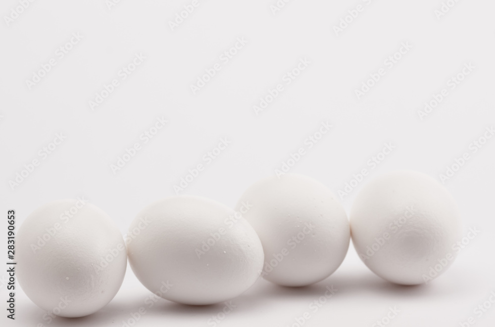 white eggs on a white background - natural shapes backdrop white eggs on a white background - natural shapes backdrop