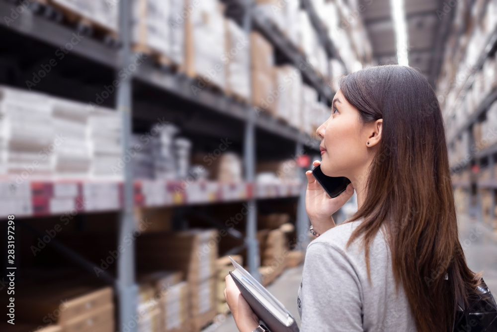 Asian woman in Home center Warehouse to buy a retail furniture and home accessories store Asian woman in Home center Warehouse to buy a retail furniture and home accessories store