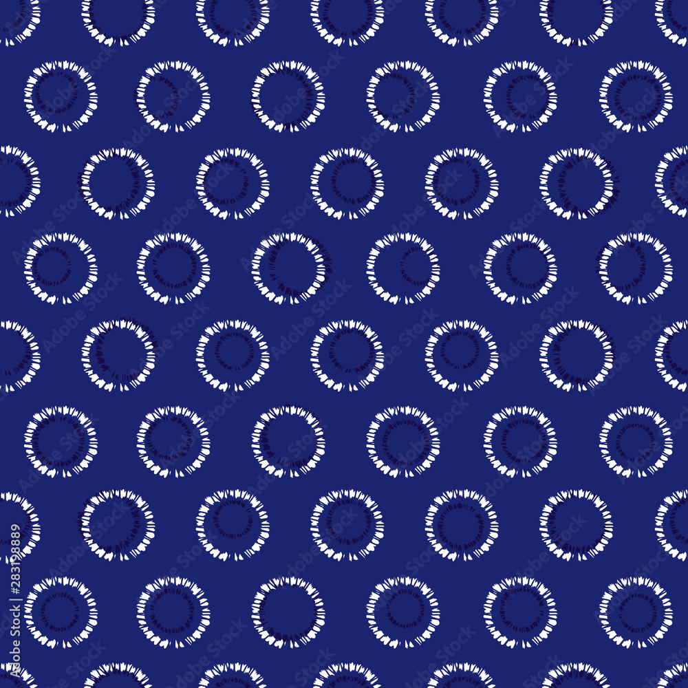 Vector blue shibori circle seamless pattern. Suitable for textile, gift wrap and wallpaper.