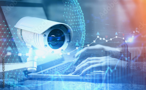 Photos Woman hands on laptop and CCTV camera interface