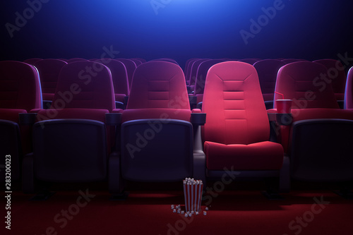 Row of empty red cinema seats