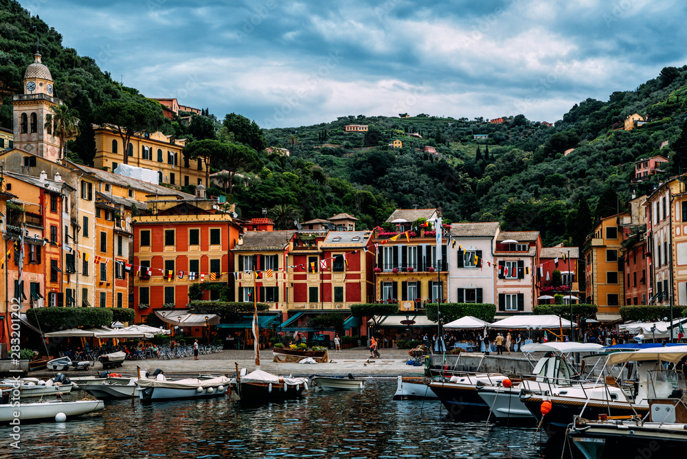 Amazing colorful mediterranean landscape, fantastic panorama of Portofino touristic village on Liguria coast, Italy, Europe. Postcard of Portofino. Travel and vacation concept.