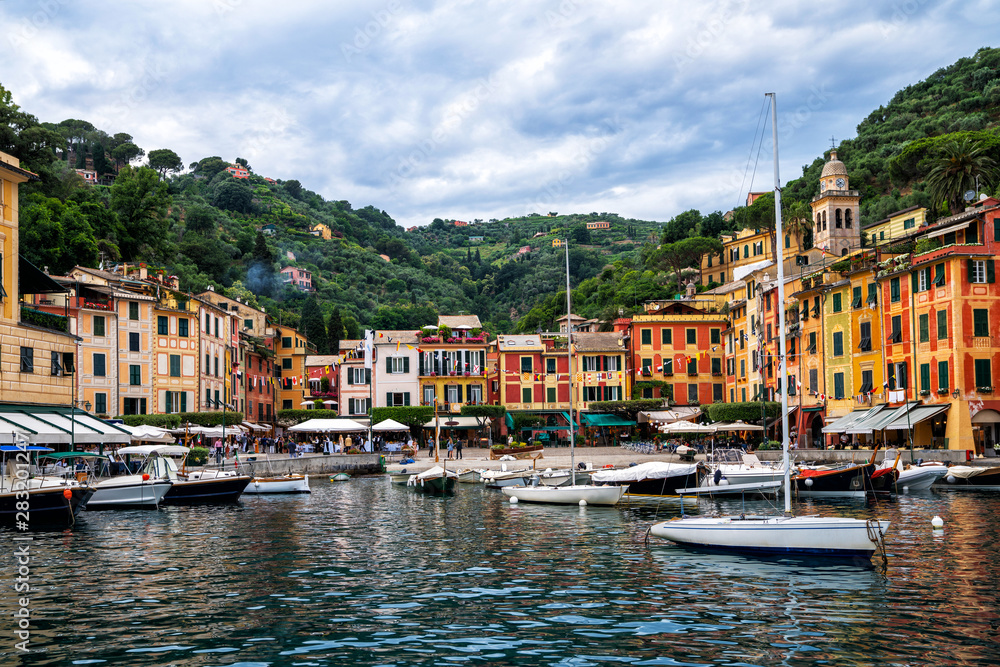 Amazing colorful mediterranean landscape, fantastic panorama of Portofino touristic village on Liguria coast, Italy, Europe. Postcard of Portofino. Travel and vacation concept.