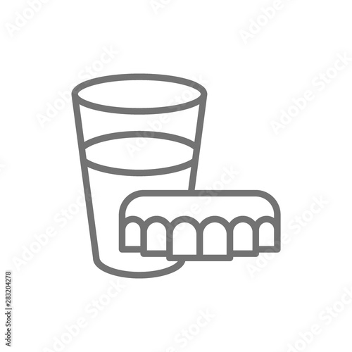 Dentures with glass of water line icon.