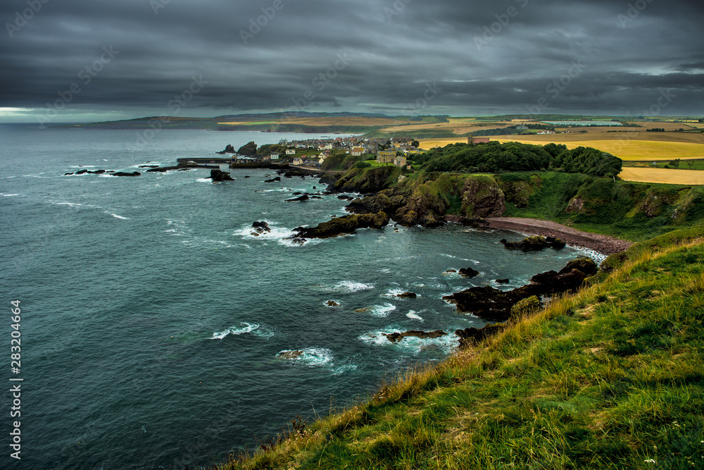 Village St. Abbs At The Spectacular Atlantic Coast of St. Abbs Head In Scotland Village St. Abbs At The Spectacular Atlantic Coast of St. Abbs Head In Scotland