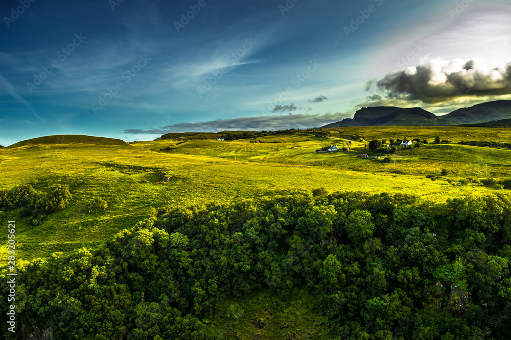 Rural Landscape With Remote Houses At The Old Man Storr Formation On The Isle Of Skye In Scotland