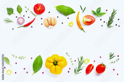 Fototapeta Naklejka Na Ścianę i Meble -  Various fresh vegetables and herbs on white background. Healthy eating concept
