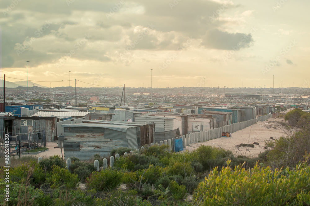Big slum village in South Africa in the sunset