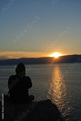 Meditation over the lake Baikal