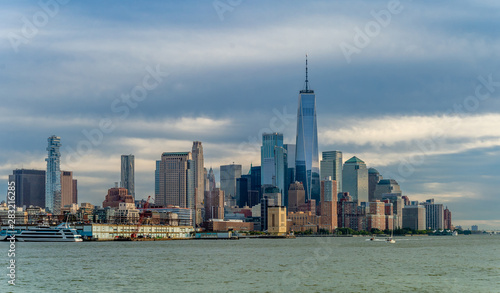 Sun set view of  Manhattan skyscrapers in New York. © borisbelenky
