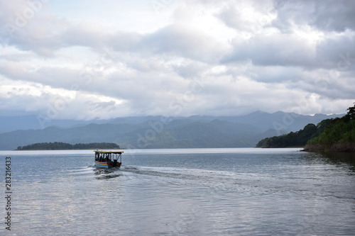 Boat on a lake with mountains
