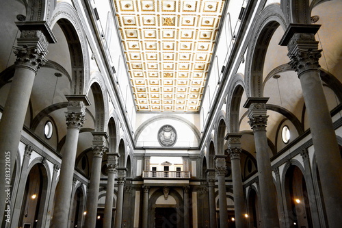 View Inside a Renaissance Style Cathedral In Florence Italy With Gray Columns and Gold Square Tiled Roof