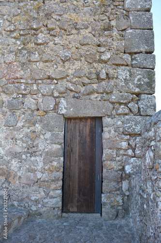 Stone Castle Tower With Wooden Doorway In a Medieval Defense Fortress in Portugal