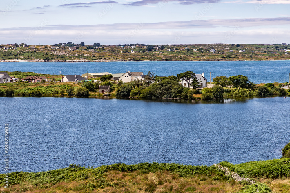 Bay with farm field and houses
