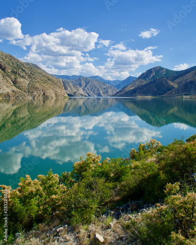 Erzurum, Tortum lake, cliff mountains and cloud reflection in water