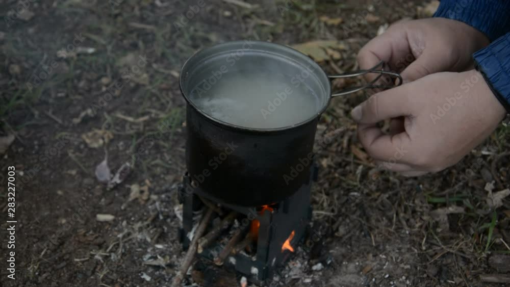 cooking soup while camping in a small sliver stove cooking soup while camping in a small sliver stove
