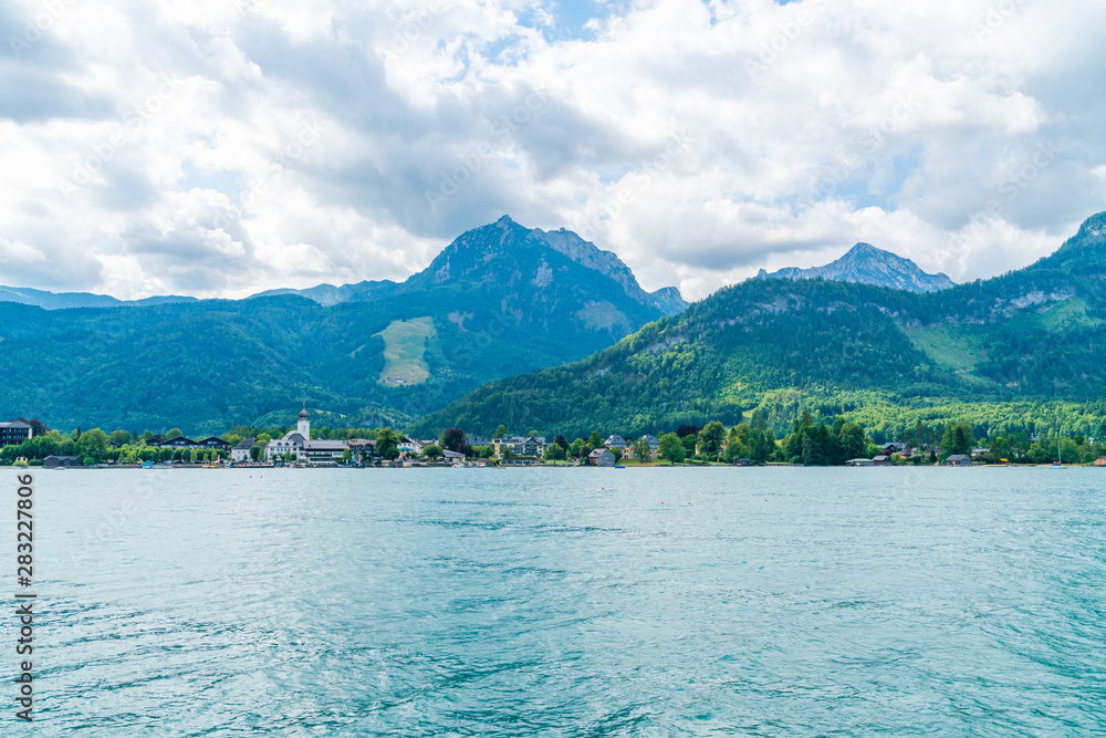 View of Stroble across lake St. Wolfgang in the Salzkammergut resort region in Austria.