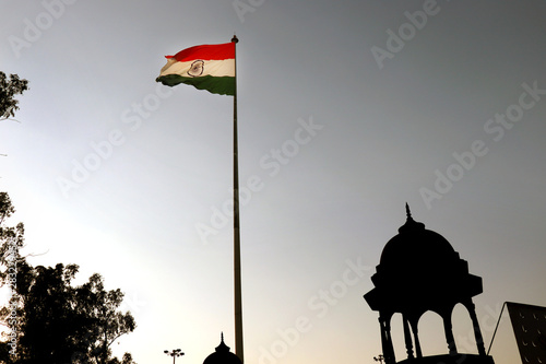 Indian National Flag waving.  The national flag of the republic of India. Picture taken from Wagha Border in Panjab, India. photo